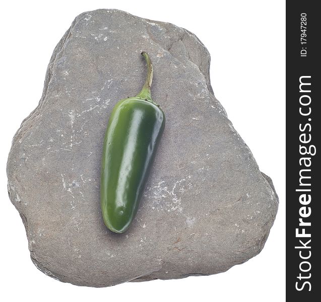 Jalapeno Pepper on a Rock Food Concept Isolated on White with a Clipping Path.