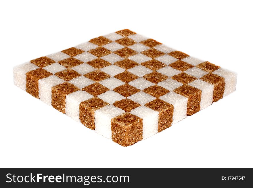 Chessboard (or checkerboard) made from white and brown shugar cubes. Chessboard (or checkerboard) made from white and brown shugar cubes.