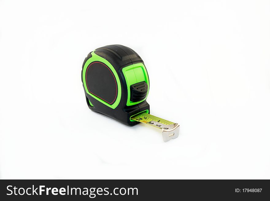 Green tape measure on a white background