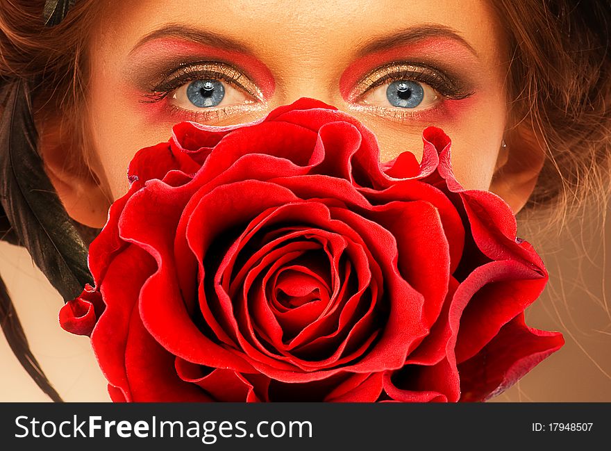 Woman eyes and red rose. Woman eyes and red rose