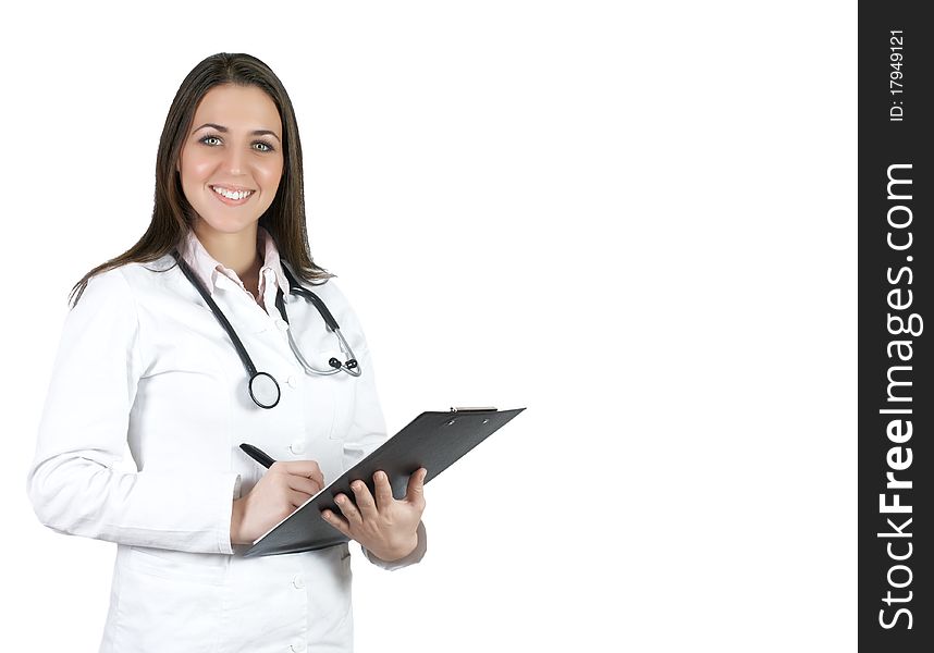 Portrait of friendly female doctor with stethoscope writes on the clipboard. Portrait of friendly female doctor with stethoscope writes on the clipboard.