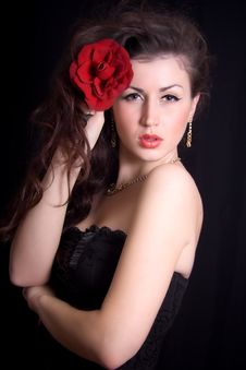 Beautiful Girl With A Red Rose In Her H Royalty Free Stock Photo