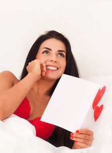 Girl Lying In Bed With Gifts, Cards, Hearts Stock Image Girl Lying In Bed With Gifts, Cards, Hearts Stock Image