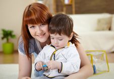 Young Mother Playing With Her Little Son Stock Photography