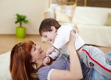 Young Mother Playing With Her Little Son Royalty Free Stock Photography Young Mother Playing With Her Little Son Royalty Free Stock Photography