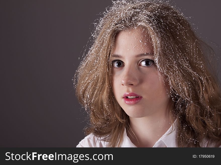 Portrait Teenage Girl With Snow In Hair