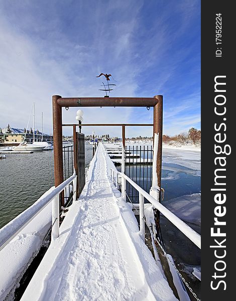 Marina near The Fresh Ketch restaurant on South Lake Tahoe covered in snow. Marina near The Fresh Ketch restaurant on South Lake Tahoe covered in snow