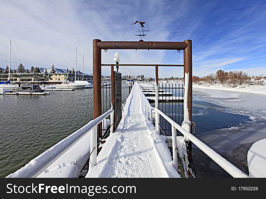 Marina near The Fresh Ketch restaurant on South Lake Tahoe covered in snow. Marina near The Fresh Ketch restaurant on South Lake Tahoe covered in snow