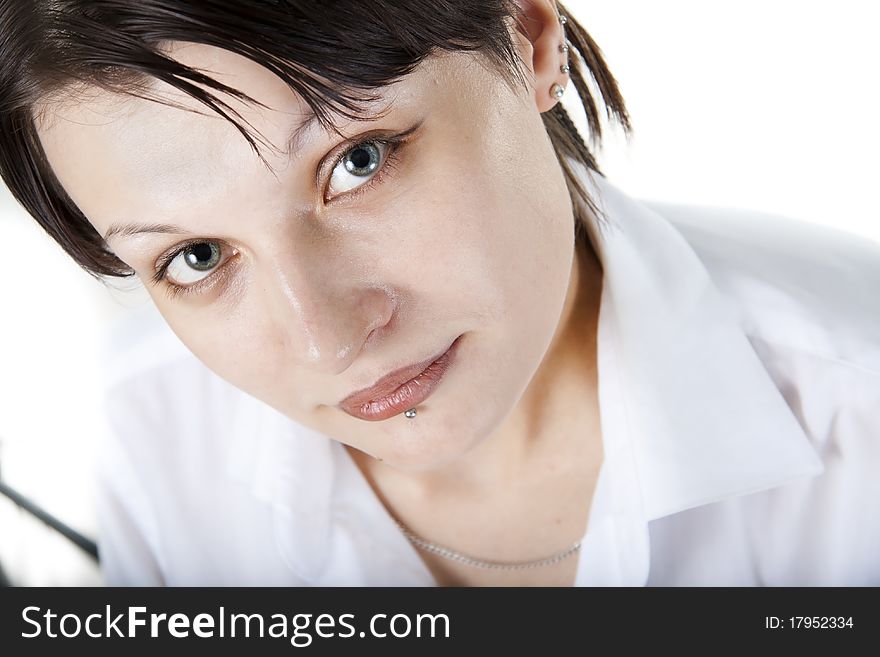 Close-up caucassian woman's face in white shirt