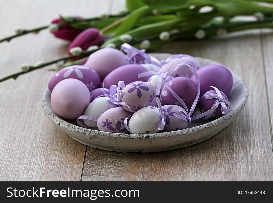 Purple Easter eggs on a plate