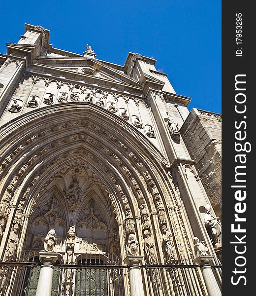 Toledo Cathedral gate in a summer evening