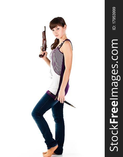 Beautiful girl with a gun and knife posing