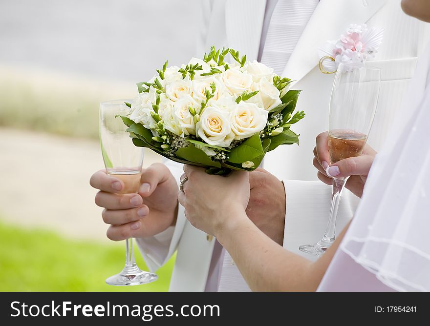 Bride give her bouquet to fiance. Bride give her bouquet to fiance