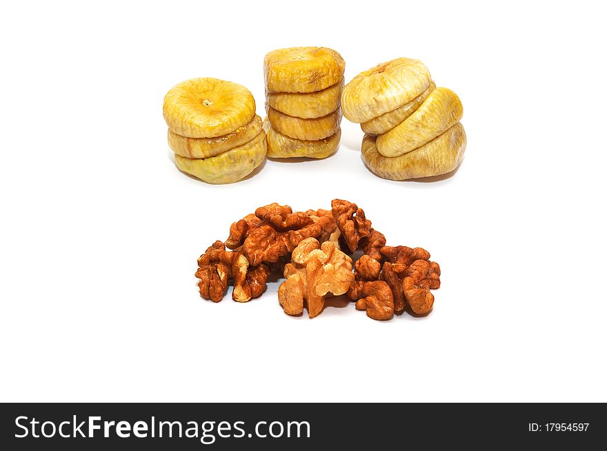 Photo of the dried banana and walnuts on white background