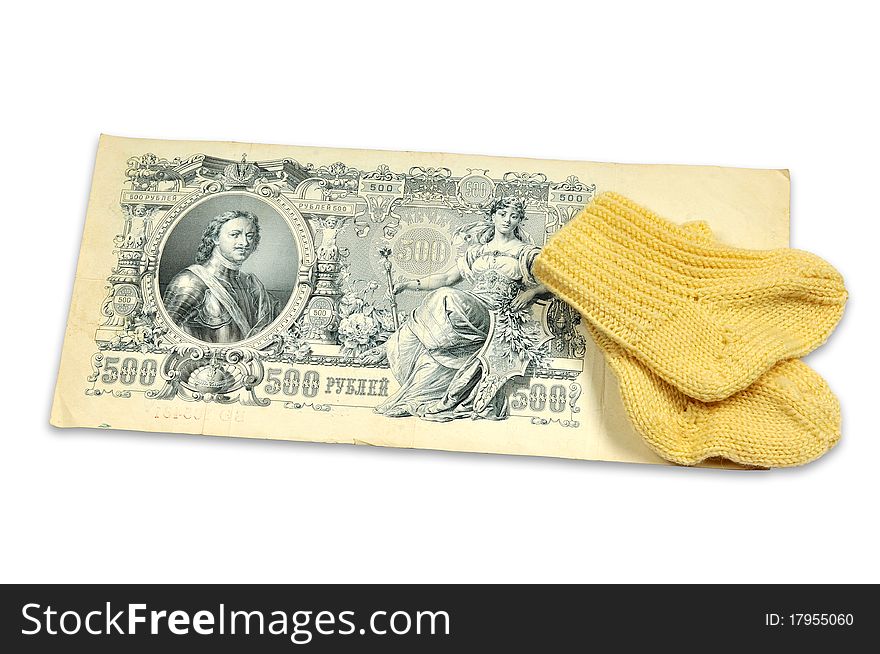 Old banknote and baby sock. Old banknote and baby sock