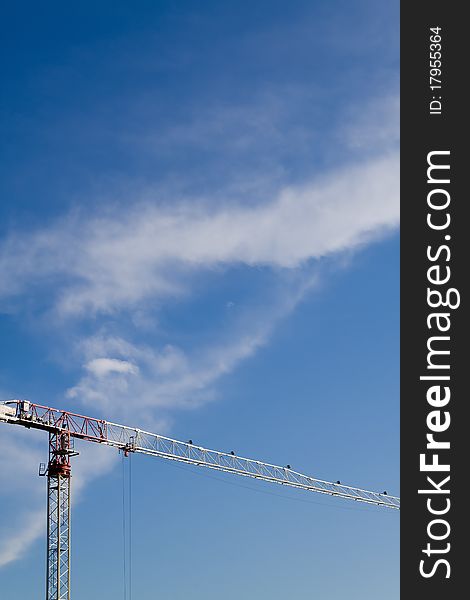 Photography of machine crane and sky with clouds. Photography of machine crane and sky with clouds