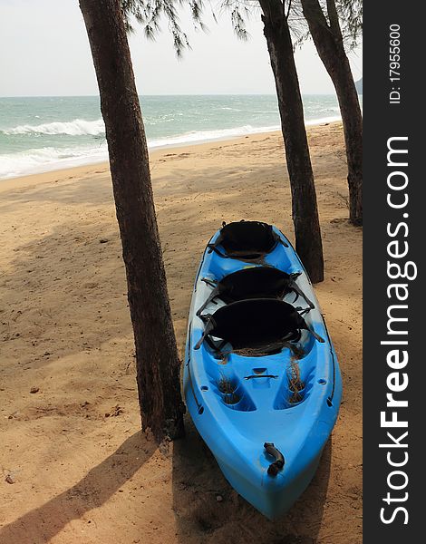 Blue kayak on the beach and sunny day