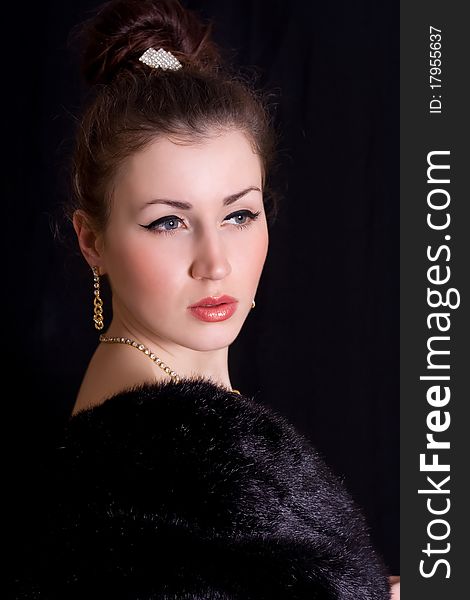 Elegant Woman In A Fur Coat