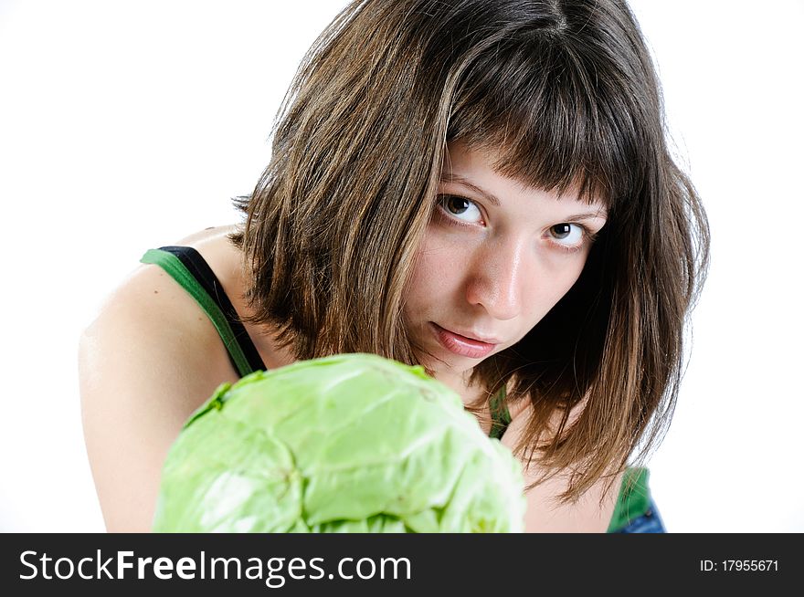 Girl with cabbage isolated on white
