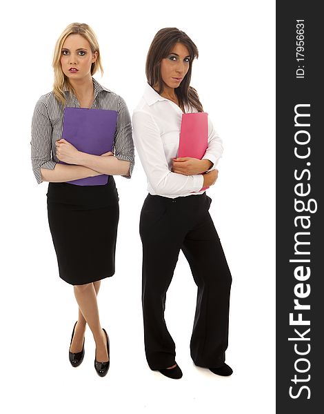 Two smart business women holding document folders. Two smart business women holding document folders