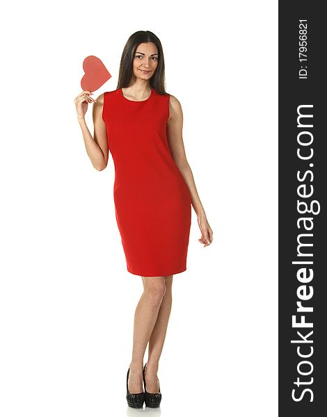 Young elegant female in red pencil-dress holding heart shape isolated on white. Young elegant female in red pencil-dress holding heart shape isolated on white