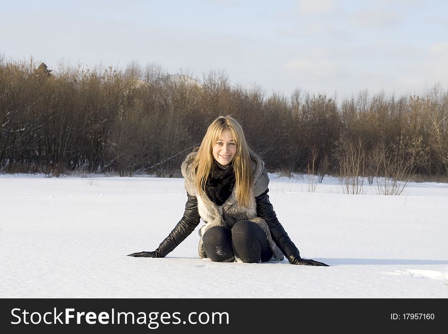 Girl having fun in winter field