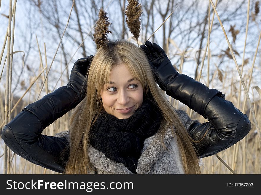 Girl having fun outdoor in winter
