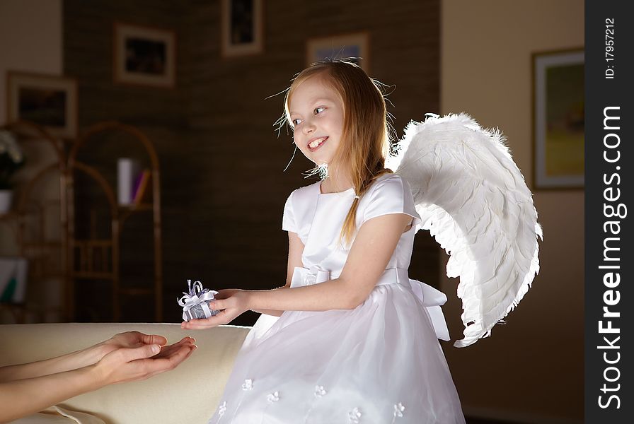 Girl In White Dressed As An Angel