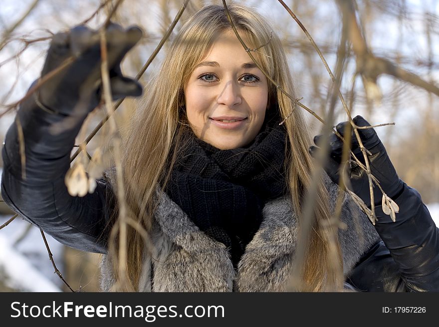 Girl in winter forest