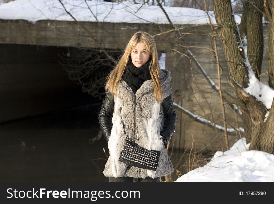 Girl walking in winter forest. Girl walking in winter forest