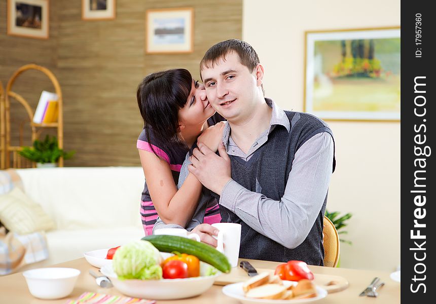 Couple at home having meal