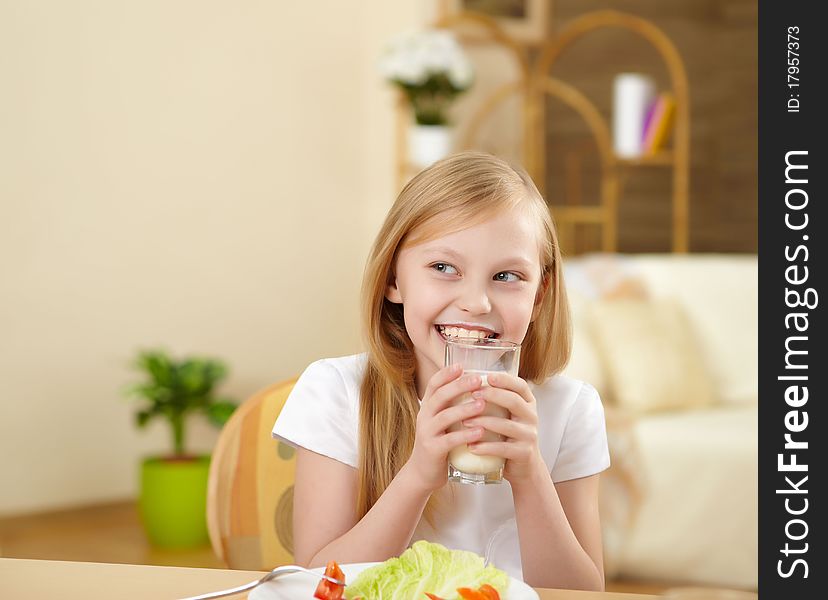 Little Girl Having Meal At Home