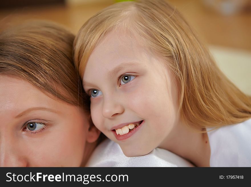 Loving mother and her teenager daughter at home together. Loving mother and her teenager daughter at home together