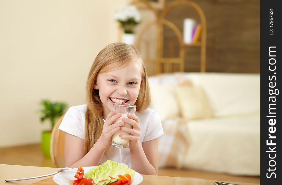 Little girl having healthy meal at home. Little girl having healthy meal at home