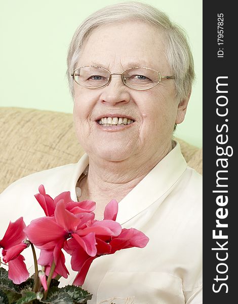 Senior lady with a flower