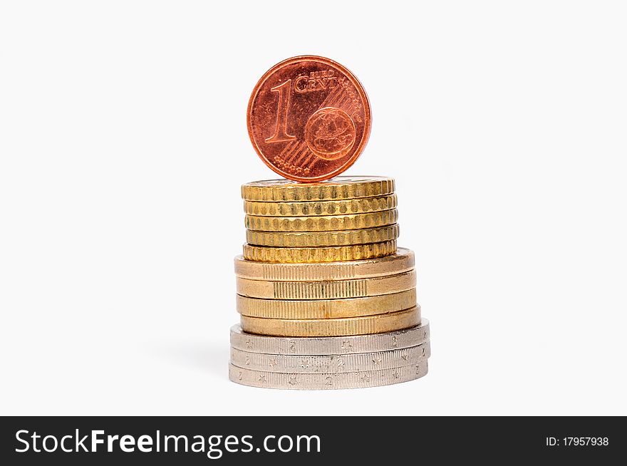One euro cents stands on a column of coins