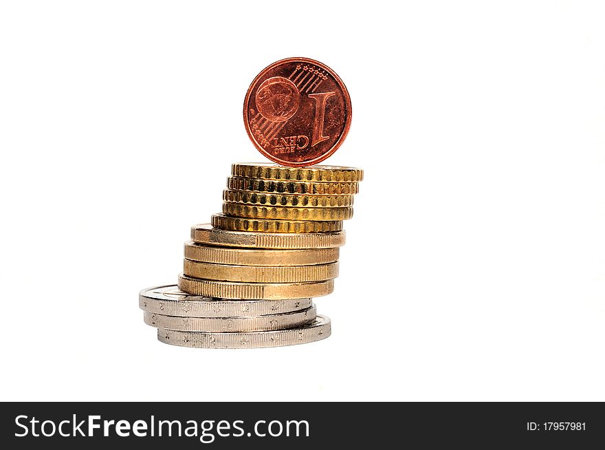 One euro cents stands on a column of coins