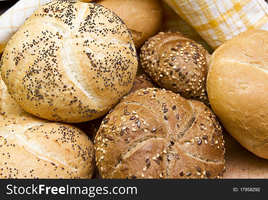 Breakfast buns assorted on kitchen table. Breakfast buns assorted on kitchen table