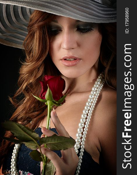 Beauty girl with rose. studio shot