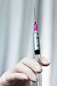 Doctor Testing Syringe Before Using Stock Images Doctor Testing Syringe Before Using Stock Images