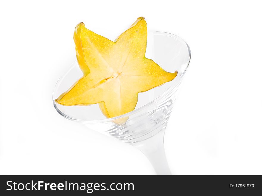Tropical fruit carambola in a glass .