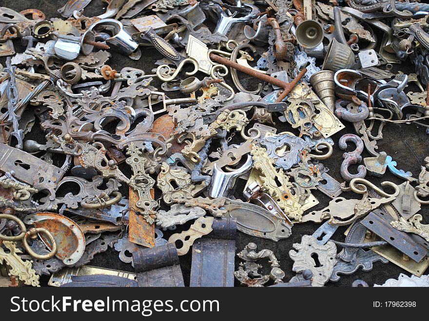 Spread collection of old keyholes, knobs, and hinges. Spread collection of old keyholes, knobs, and hinges