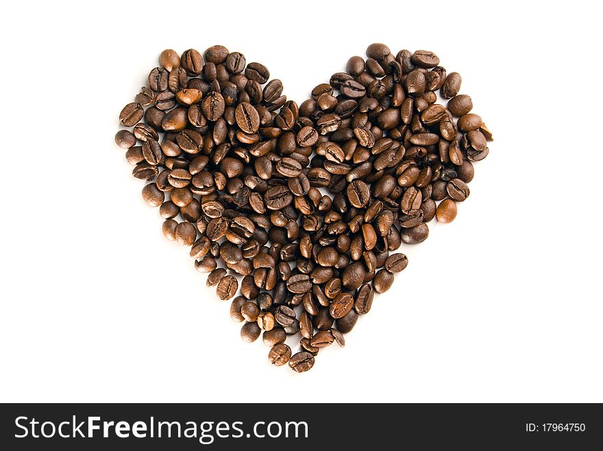 Coffee beans in the form of heart, is isolated on a white background. Coffee beans in the form of heart, is isolated on a white background