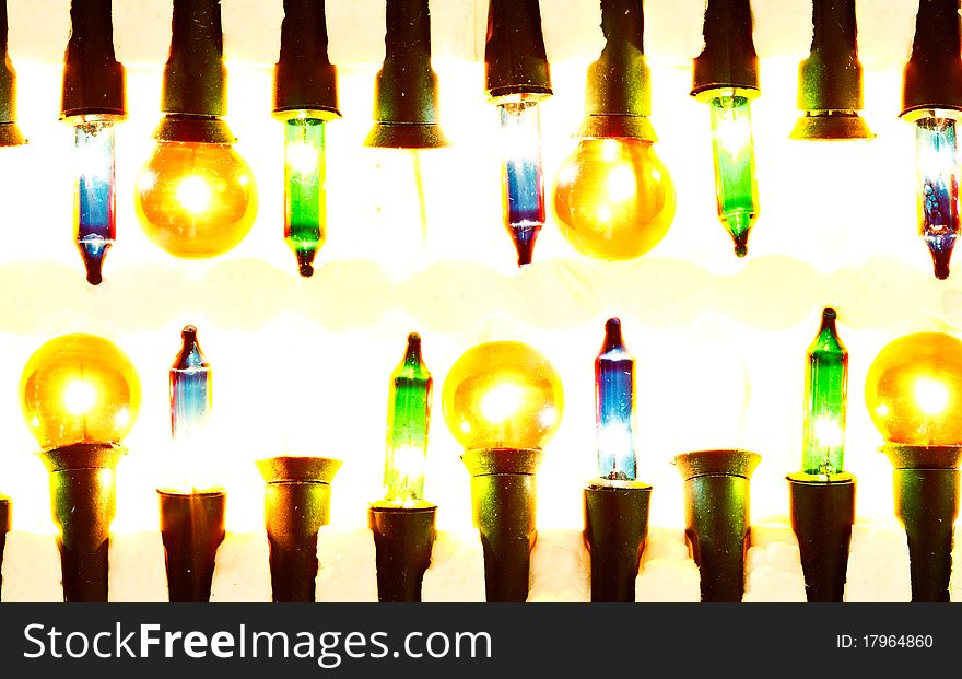 Colorful light bulb in foam box. Colorful light bulb in foam box