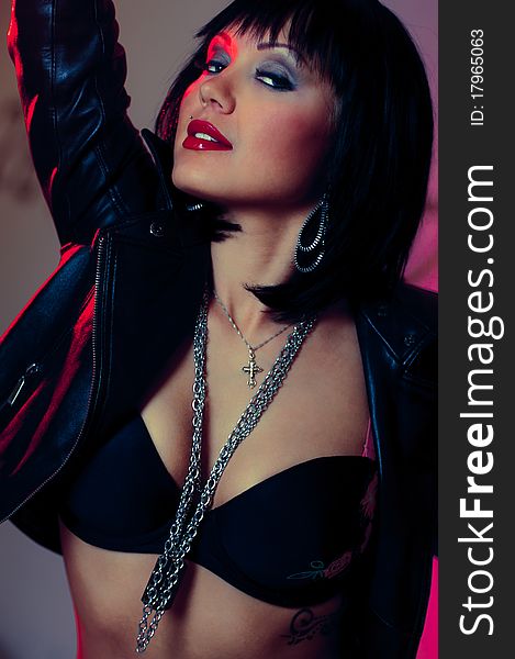 Brunette in sensual fashion photo with red lips in old fashion style. Brunette in sensual fashion photo with red lips in old fashion style