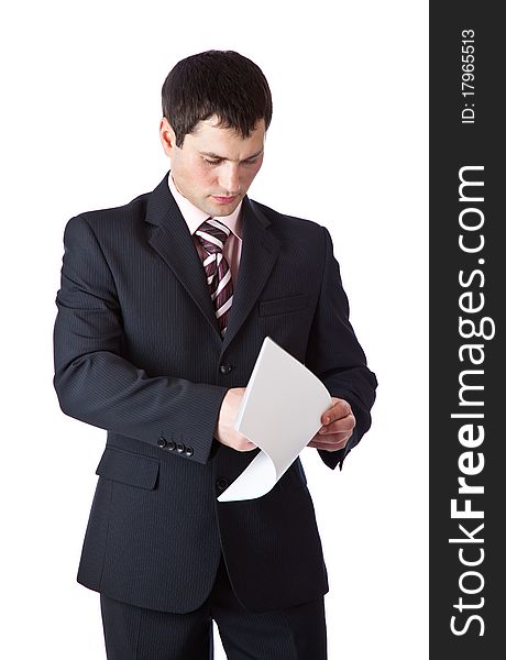 A handsome man is reading firm documents. isolated on a white background