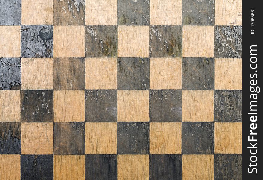 Old chess board texture background. Old chess board texture background