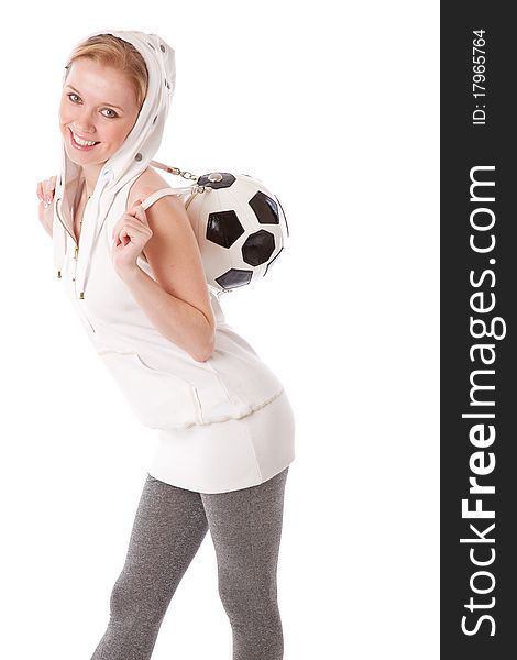 A smiling beautiful girl with a football ball on her back. isolated on a white background. A smiling beautiful girl with a football ball on her back. isolated on a white background