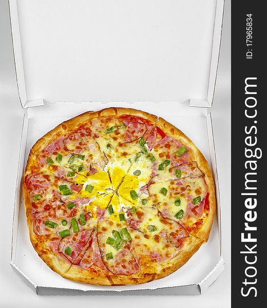 Pizza in paper box isolated. Pizza in paper box isolated