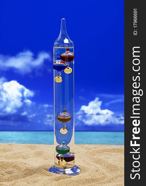 Galileo thermometer on the beach. Galileo thermometer on the beach